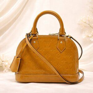 Authentic Louis Vuitton Alma BB Vernis Mustard Patent Leather Crossbody Bag